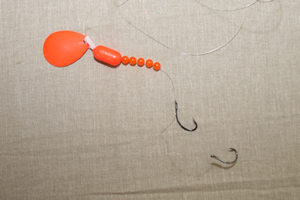 Orange with double crawler hook